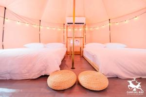 Postel nebo postele na pokoji v ubytování 99Glamping