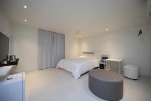 Postel nebo postele na pokoji v ubytování Soho Hotel