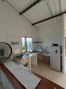 Kuchyň nebo kuchyňský kout v ubytování Refugio del Sol