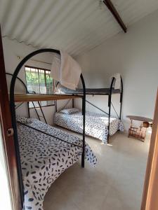 Postel nebo postele na pokoji v ubytování Refugio del Sol + 8 fotografií