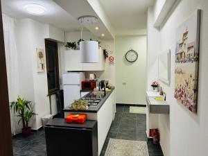 Kuchyň nebo kuchyňský kout v ubytování B&B Porta Aperta