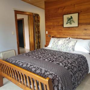 Ένα ή περισσότερα κρεβάτια σε δωμάτιο στο Lavender Cottage at Akaroa Lavender