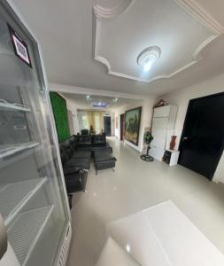 TV a/nebo společenská místnost v ubytování Hostal Viva Mar