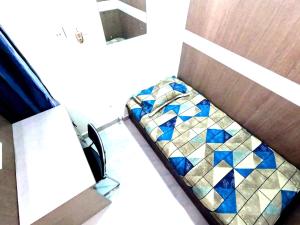a room with a bed with stained glass at Utopia Guest house for men in New Town