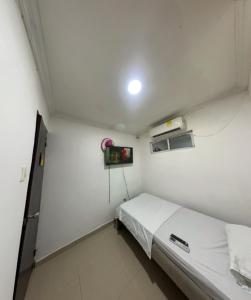 Postel nebo postele na pokoji v ubytování Hostal Viva Mar