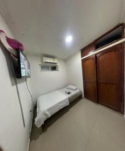 Postel nebo postele na pokoji v ubytování Hostal Viva Mar