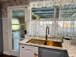 a kitchen with a sink and a window at Lenlie Farm in Howard +108 photos