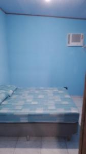 Postel nebo postele na pokoji v ubytování Chalé toque toque pequeno