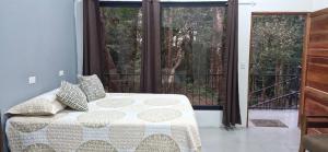 Ένα ή περισσότερα κρεβάτια σε δωμάτιο στο Apartamento Bosque Encantado1