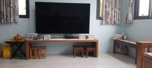 TV a/nebo společenská místnost v ubytování Chin-Lan B&B