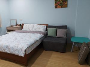 Postel nebo postele na pokoji v ubytování Chin-Lan B&B