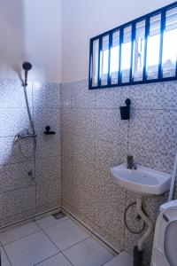 Koupelna v ubytování Be2Be One-Bedroom Apartment Paramaribo Noord