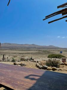 a road in the middle of a desert at Puemape Planet Eco Hostel in Puémape