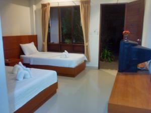 Cama o camas de una habitación en Modern Resort