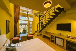 Televisyen dan/atau pusat hiburan di Leofoo Resort Guanshi