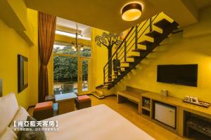 Televisyen dan/atau pusat hiburan di Leofoo Resort Guanshi