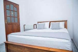 Postel nebo postele na pokoji v ubytování VDN House