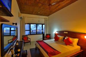 Giường trong phòng chung tại Hotel Lanka Super Corals