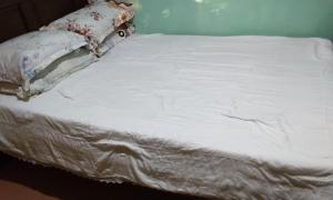 Postel nebo postele na pokoji v ubytování Marinduque Mendoza Residence