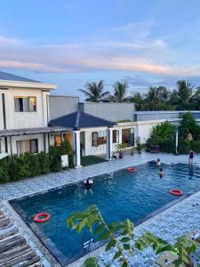 a swimming pool with frisbees in it at The Dreamers Homestay in Hue