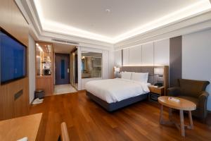 Postel nebo postele na pokoji v ubytování Hotel Interburgo Daegu + 37 fotografií
