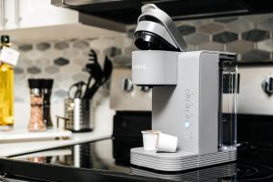 a coffee maker sitting on top of a kitchen counter at Breathtaking Oceanview Studio in Redondo Beach +27 photos
