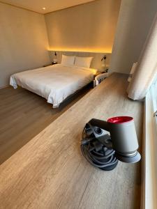 Postel nebo postele na pokoji v ubytování 衿后禾居Good Hotel
