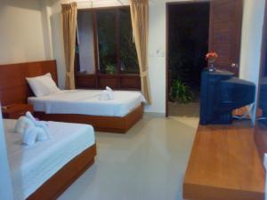 Cama o camas de una habitación en Modern Resort