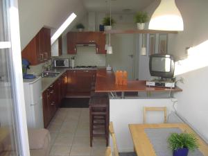 Bed and Breakfast Den Bosch tesisinde mutfak veya mini mutfak