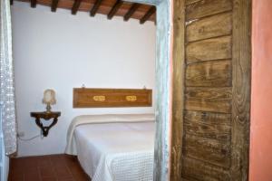 Postel nebo postele na pokoji v ubytování Lionforti Da Vico