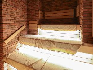 Cama ou camas em um quarto em Dormy Inn Wakkanai