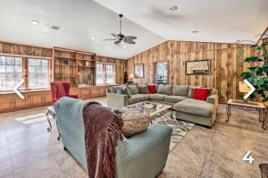 a living room with a couch and a table at Enjoyable Stay and Play Near Casino and Hospital in Pine Bluff