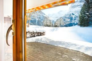Το MOM - Alpine Boutique Apartments, Grindelwald gletscher, Eiger View Terrace Studio τον χειμώνα