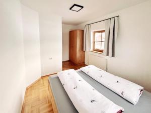 Voodi või voodid majutusasutuse Apartment Wachinghof toas