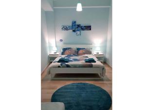 Tempat tidur dalam kamar di Bari Vecchia Dimora