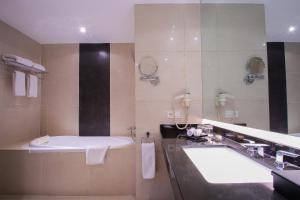 Koupelna v ubytování FUGO Hotel Banjarmasin