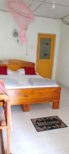Cama o camas de una habitación en Tree Cool Resort