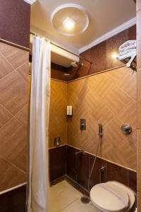 Koupelna v ubytování Hotel Sunstar Grand