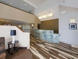 a lobby of a hospital with a waiting room at Baymont by Wyndham Fort Collins in Fort Collins +12 photos