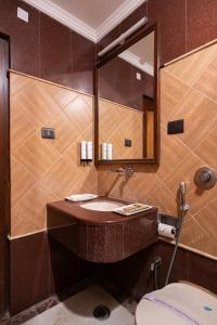 Koupelna v ubytování Hotel Sunstar Grand