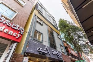 Hotel Chalet, Madiwala的证书、奖牌、标识或其他文件
