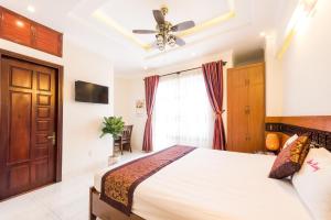 Letto o letti in una camera di Dai Long Hotel