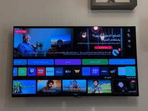 Μια τηλεόραση ή/και κέντρο ψυχαγωγίας στο Quiet and distinctive apartment with a wonderful v +15 φωτογραφίες