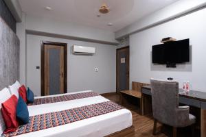 TV a/nebo společenská místnost v ubytování Hotel Sunstar Grand