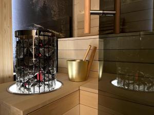 a wine cellar with a rack of wine bottles at Mid Mountain Apartment Tirol in Wiesing +41 photos