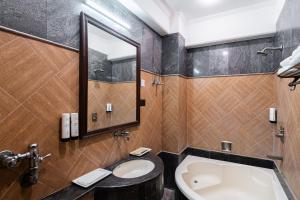 Koupelna v ubytování Hotel Sunstar Grand