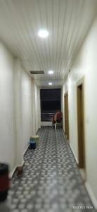 an empty hallway of an office building with a room at Gajlaxmi HOTEL UJJAIN in Ujjain