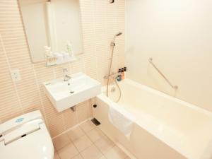 Koupelna v ubytování Nishitetsu Resort Inn Naha