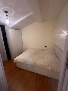 Postel nebo postele na pokoji v ubytování X2 apartment Bakuriani