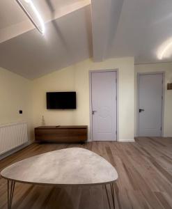 TV a/nebo společenská místnost v ubytování X2 apartment Bakuriani